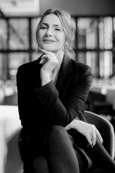 portrait-smiling-successful-businesswoman-looking-into-camera-sitting-restaurant-business-lady-with-stylish-hairstyle-wears-elegant-suit-business-meeting-attractive-appearance-modified Wonder Women Book Club